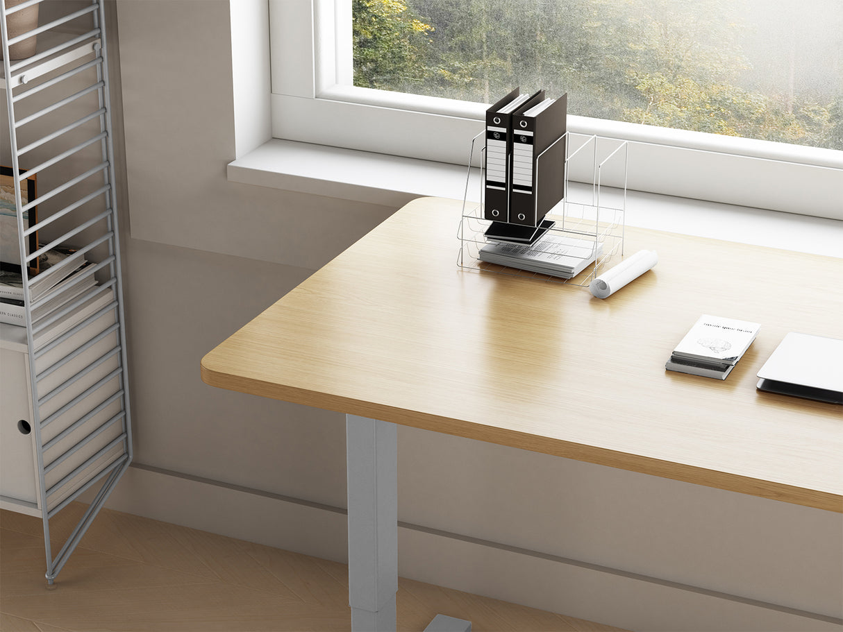 El escritorio elevable ajustable Maidesite T2 Pro Plus viene con una parte superior de esquina redondeada para evitar lesiones por accidentes.